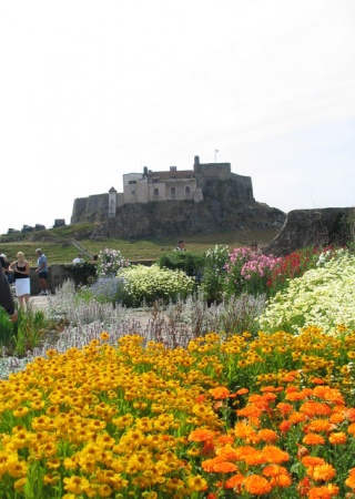 Lindisfarne Castle with Jekyll Garden | photo by Ann Young, Public Domain